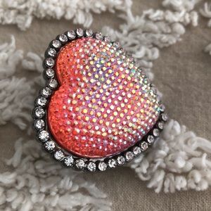 Pink heart adjustable ring.